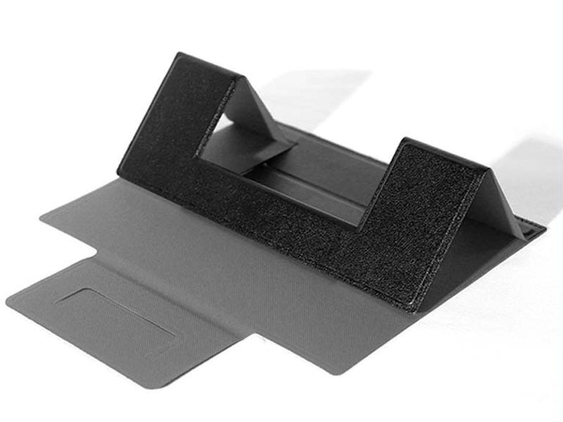 GRAPLEANA — The ideal companion for your laptop or tablet: a foldable leather stand without