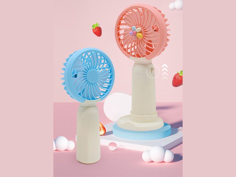 VENTIMOV — Handheld fan with smartphone holder designed to keep you cool anywhere